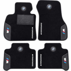 May include: Set of four black car floor mats. Each mat features the BMW logo, the M Performance logo, and the BMW M logo in blue, white, and red. The front mats have a carbon fiber-style textured insert.