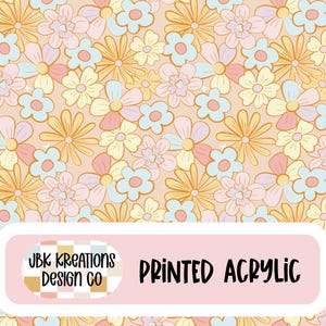 May include: Printed acrylic sheet featuring a repeating floral pattern in pastel colors. The design includes flowers in shades of yellow, pink, and blue on a peach background. The text "PRINTED ACRYLIC" is displayed on a pink label.