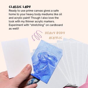 May include: White primed canvas with the text "Primed Canvas" and "CLASSIC LADY". A small blue painting of a rabbit is displayed on one of the canvases. The text "HEAVY BODY ACRYLIC" is also visible.