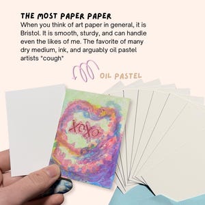 May include: The image showcases Bristol art paper, with the text "THE MOST PAPER PAPER". A hand holds a small card with a colorful heart design and the text "xoxo". A stack of white paper and a blue envelope are also visible.