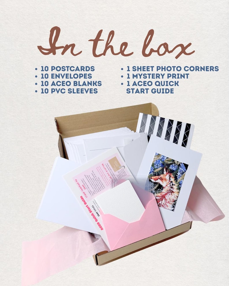 May include: A cardboard box containing 10 postcards, 10 envelopes, 10 ACEO blanks, 10 PVC sleeves, 1 sheet of photo corners, 1 mystery print, and 1 ACEO quick start guide. The text In the box is printed above the items in a brown script font.