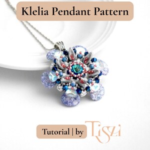 May include: A handmade pendant necklace with a floral design. The pendant features a central teal-colored stone surrounded by blue, silver, and purple beads. The text "Klelia Pendant Pattern" and "Tutorial | by Tiszi" are visible.
