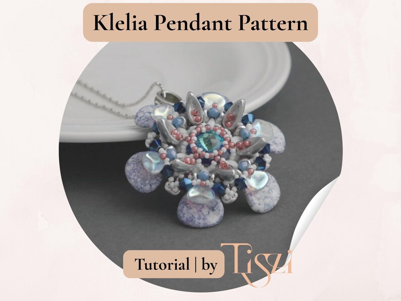 May include: A close-up of a pendant necklace with a floral design. The pendant features a central turquoise bead surrounded by pink, blue, and silver beads. The text "Klelia Pendant Pattern" is at the top.