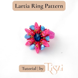 May include: A handmade ring with a floral design. The ring features a large, dark blue center stone surrounded by pink and light blue petal-shaped beads. The ring's band is a textured pink. Text on the image reads "Lartia Ring Pattern" and "Tutorial | by Tiszi."