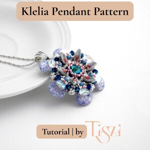 May include: A beaded pendant necklace with a floral design. The pendant features a central teal-colored bead surrounded by silver, blue, and red accents. The necklace is on a silver chain. Text on the image reads "Klelia Pendant Pattern" and "Tutorial | by Tiszi".