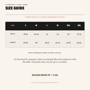 May include: A size guide chart for Comfort Colors 1717 apparel, featuring a table with width and length measurements in inches for sizes S through 3XL. The text includes instructions on measuring a shirt laid flat and notes a 1.5 inch variance.