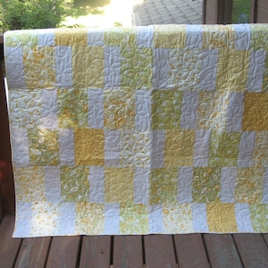 Yellow floral summer lap or crib quilt