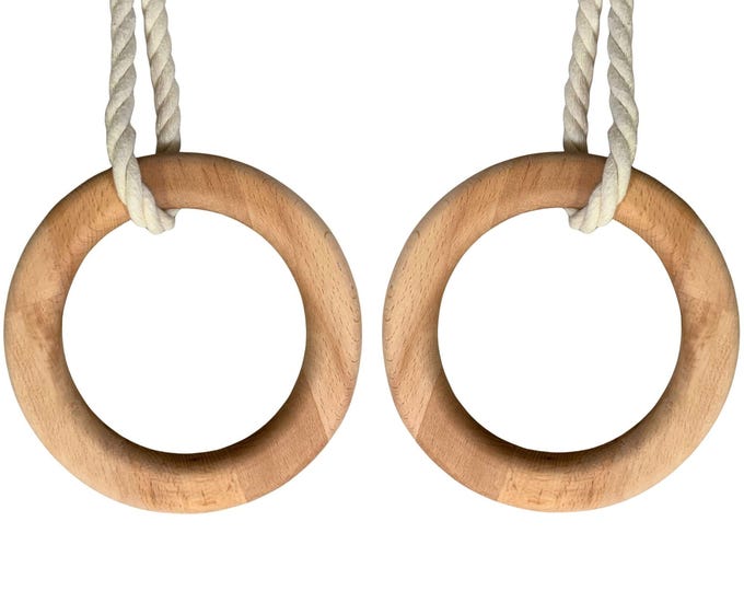 Gymnastics rings for children, made of beech wood. The rope length is easily adjustable.