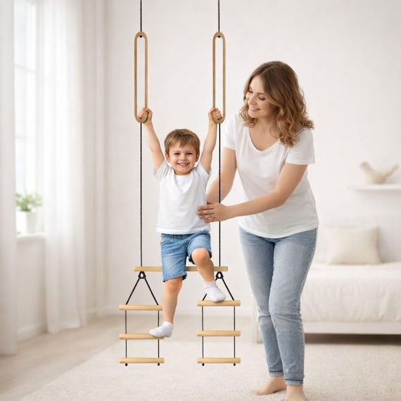 Three-tiered trapeze with long eyelets at the top. Trapeze for promoting body awareness and coordination; trapeze with a new concept.