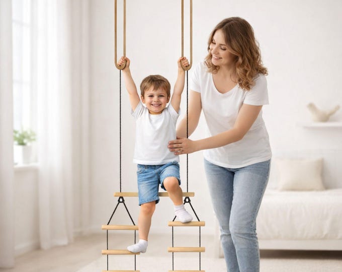 A trapeze with a new design. Three-tiered trapeze with long eyelets at the top. A trapeze designed to promote body awareness and coordination.