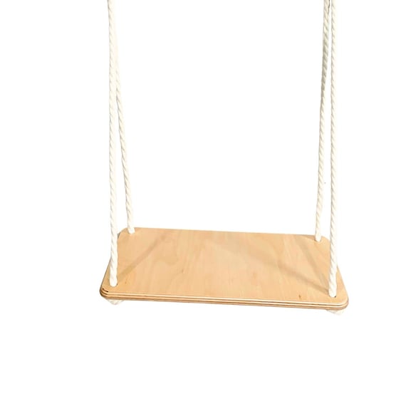 Children's swing. Swing for the children's room. Swing with adjustable rope length. Wooden swing.