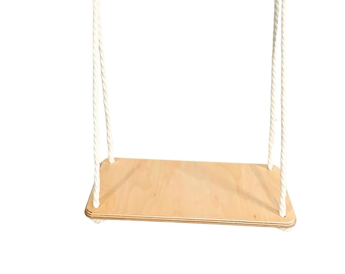 Children's swing. Swing for the children's room. Swing with adjustable rope length. Wooden swing.