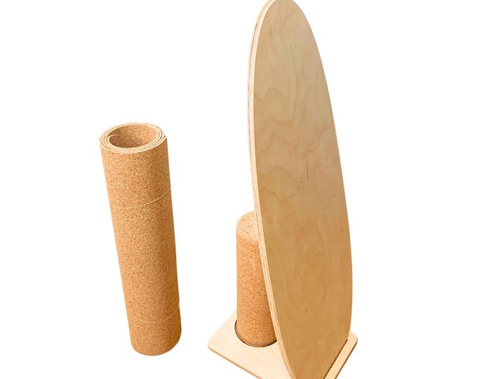 Balance board. A stable balance board. Balance boards including cork roll and stand. Cork roll and balance board mat made of cork.