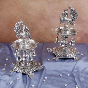 German Silver Oil Lamp with Bells 11 Inch Brass Diya for Diwali Pooja Room Home Temple Decor Housewarming Gift - Peacock Samai Oil Wick Lamp