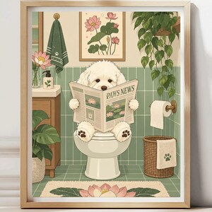 May include: A framed wall art print featuring a fluffy white dog sitting on a toilet reading a newspaper titled PAWS NEWS. The bathroom scene includes green tiled walls, a hanging plant, a towel, a toilet paper roll, and lotus flower decor.