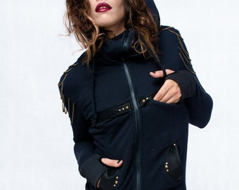May include: A black hooded jacket with gold accents and a zip closure. The jacket has a black leather trim and a black leather pocket on the left side.