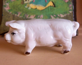 little white piggy figurine