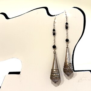 31/4" Sterling silver and Onxy dangle earrings, slightly ornate with a bohemian flair.