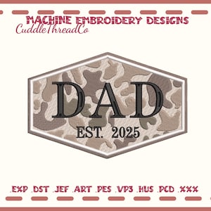 May include: Machine embroidery design featuring the word "DAD" in black, set within a camouflage-patterned hexagon. The text "EST. 2025" is below. The design is framed with a light beige border. The text "MACHINE EMBROIDERY DESIGNS" and "CuddleThreadCo" are at the top.