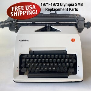Replacement Parts for a Early 1970s Olympia Typewriter, Salvaged Typewriter Parts, Panels and Rubber Feet, Typewriter Repair Parts Only