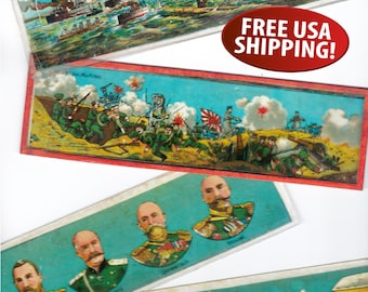 May include: A collection of antique, colorful, illustrated cards depicting military scenes and portraits. The cards feature detailed illustrations of battleships, soldiers, and portraits of military figures. The cards are in various sizes and shapes, with a red oval that says "FREE USA SHIPPING!"