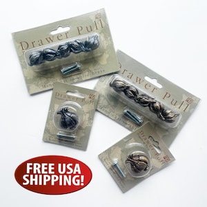 May include: Four packages of hand-cast solid brass drawer pulls and knobs in silver and bronze finishes. Each package includes mounting hardware and is labeled with the text Drawer Pull and Figi. The items are displayed on cardboard backing.