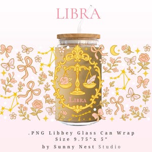 May include: A glass can wrap with a Libra zodiac theme. The design incorporates a scale, roses, butterflies, bows, and constellations in gold and pink. The word "LIBRA" is displayed at the top and bottom. The wrap measures approximately 24.77 cm x 12.7 cm.