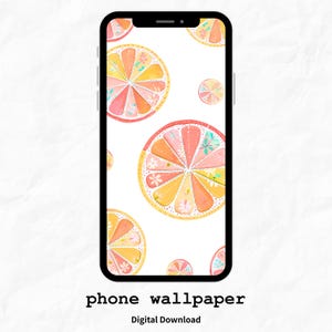 Op de afbeelding: Een smartphone toont een levendige achtergrond met aquarel sinaasappelschijfjes in roze, geel en oranje, met bloemaccenten. De telefoon staat tegen een witte achtergrond. De tekst "phone wallpaper" en "Digital Download" staat onderaan.