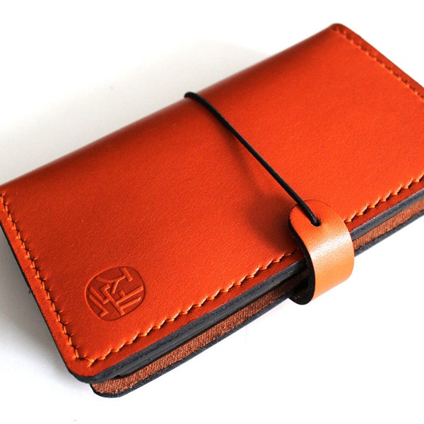 Hand stitched iPHONE 5 / 5s  Wallet with a Silicone Case in Burnt ORANGE leather