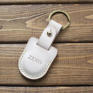 Llavero de cuero AirTag, funda Airtag, llavero de cuero AirTag, AirTag de cuero en cuero beige natural de grano completo, personalización gratuita