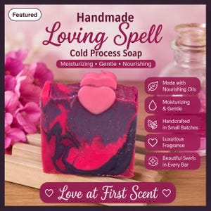 May include: A rectangular bar of cold process soap with a marbled purple and pink pattern, topped with two small pink heart-shaped soap pieces. The text reads: Handmade Loving Spell Cold Process Soap, Moisturizing, Gentle, Nourishing, Love at First Scent.