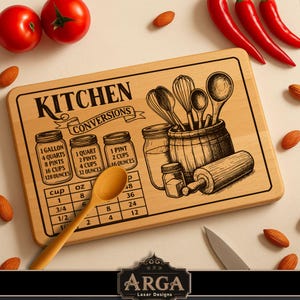 May include: Wooden kitchen conversion cutting board with engraved illustrations of kitchen tools, jars, and measurements. The board includes text for kitchen conversions. A wooden spoon rests on the board, surrounded by tomatoes, almonds, and chili peppers.