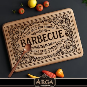 May include: A wooden chopping board with the word "BARBECUE" engraved in a decorative font, framed by floral patterns. The text "THE BEST BBQ AROUND" and "NOTHING ELSE COMPARES" are also present. A wooden spoon and fresh vegetables are arranged around it.
