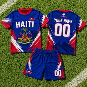 A pair of blue and red sports jerseys and shorts, with the word "HAITI" printed on them, along with a number "00" and a flag design.