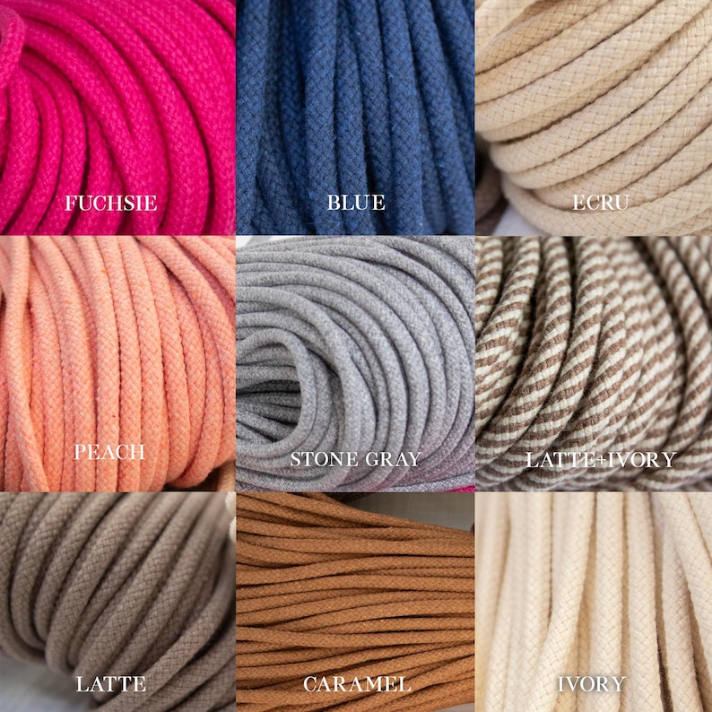 May include: Nine spools of colourful rope in various shades. Colours include fuchsia, blue, ecru, peach, stone grey, latte/ivory, latte, caramel, and ivory. Each spool has a label with the colour name.