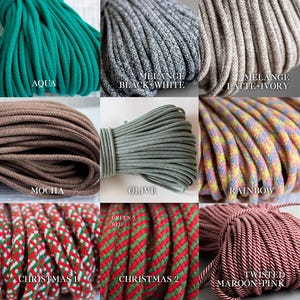 May include: Nine bundles of colourful rope in various shades. Colours include aqua, black and white melange, latte and ivory melange, mocha, olive, rainbow, Christmas 1, Christmas 2, and twisted maroon pink. Each bundle is tightly wound.