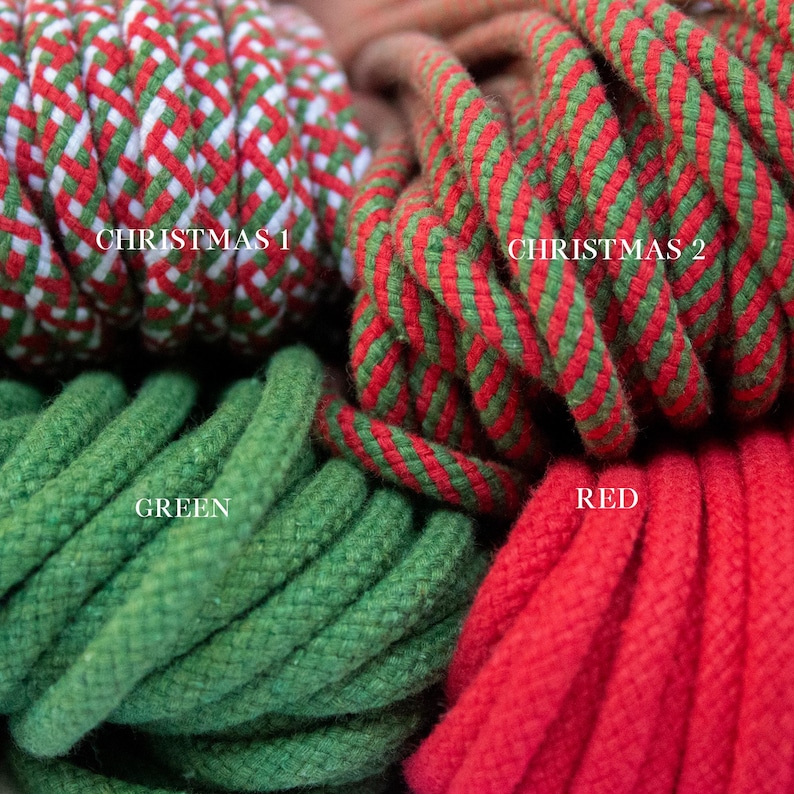 May include: Close-up of colourful rope bundles. The image features ropes in red, green, and white, with the text "CHRISTMAS 1", "CHRISTMAS 2", "GREEN", and "RED". The ropes are tightly coiled, showcasing their texture and colour variations.
