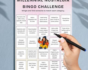 May include: Millennial Nostalgia Bingo Challenge game board with various pop culture references. The game includes squares like "Burned a CD" and "Used a Hotmail email address." A hand holding a pen points to a square.