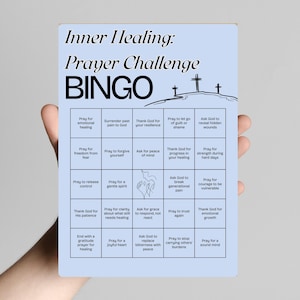 May include: A light blue Bingo card titled "Inner Healing: Prayer Challenge BINGO." The card features a grid with various prompts related to prayer and spiritual well-being, including "Pray for emotional healing" and "Pray for a joyful heart."