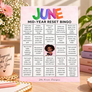 May include: A June Mid-Year Reset Bingo card featuring a colorful title, a grid of self-care prompts, and a central illustration of a cartoon character. The card includes text such as Track what drains you, Set one firm boundary, and She Rises Designs.