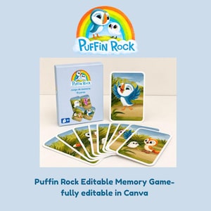 May include: A memory game set with a light blue box and cards, featuring the "Puffin Rock" logo and cartoon puffins. The box reads "Puffin Rock Juego de memoria 12 pares". The cards show colorful puffin illustrations.