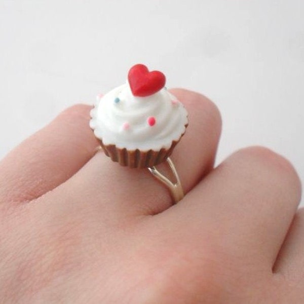 cupcake ring with red heart and sprinkles