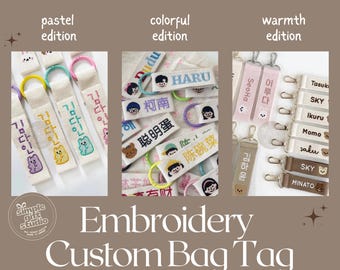 May include: An assortment of custom embroidered bag tags in pastel, colorful, and warmth editions. Each tag features personalized text and illustrations, with various colors and designs. The tags are attached to keychains.