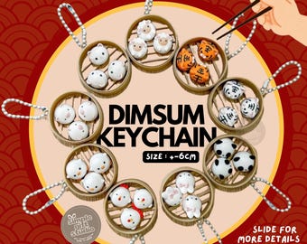 May include: A collection of dim sum-themed keychains, each featuring miniature dumplings with animal designs, such as sheep, tigers, and pandas, presented in bamboo steamer baskets. The text "DIMSUM KEYCHAIN" is displayed. Size is approximately 6cm.
