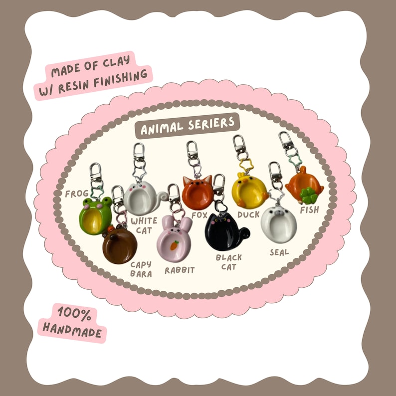May include: A collection of handmade clay keychains with resin finishing, featuring various animal designs such as a frog, cat, fox, duck, and fish. The keychains are attached to silver-colored keyrings. The text "ANIMAL SERIERS" is displayed.