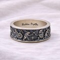 Medieval Marginalia Silver Ring for Men: Handmade 925 Sterling Silver Band with Weird Medieval Characters, Oxidized Finish product logo