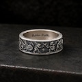 Medieval Marginalia Silver Ring for Men: Handmade 925 Sterling Silver Band with Weird Medieval Characters, Oxidized Finish product logo