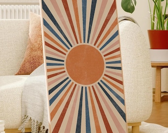 Könnte beinhalten: Ein Sonnenstrahlen-Druck im Retro-Stil mit einer großen orangefarbenen Sonne in der Mitte. Der Sonnenstrahlen-Druck besteht aus abwechselnden Streifen in Pink, Orange, Rot, Blau und Beige.