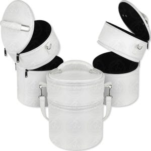 May include: White, round hat boxes with black interiors and silver hardware. The boxes have handles and zippers. One box has a shoulder strap. The boxes are open, revealing the interior.