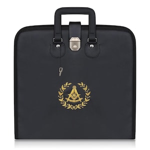 May include: Black briefcase with a handle and a silver clasp. The front of the case features a gold embroidered emblem of a compass and square within a wreath. A small key hangs from the case.